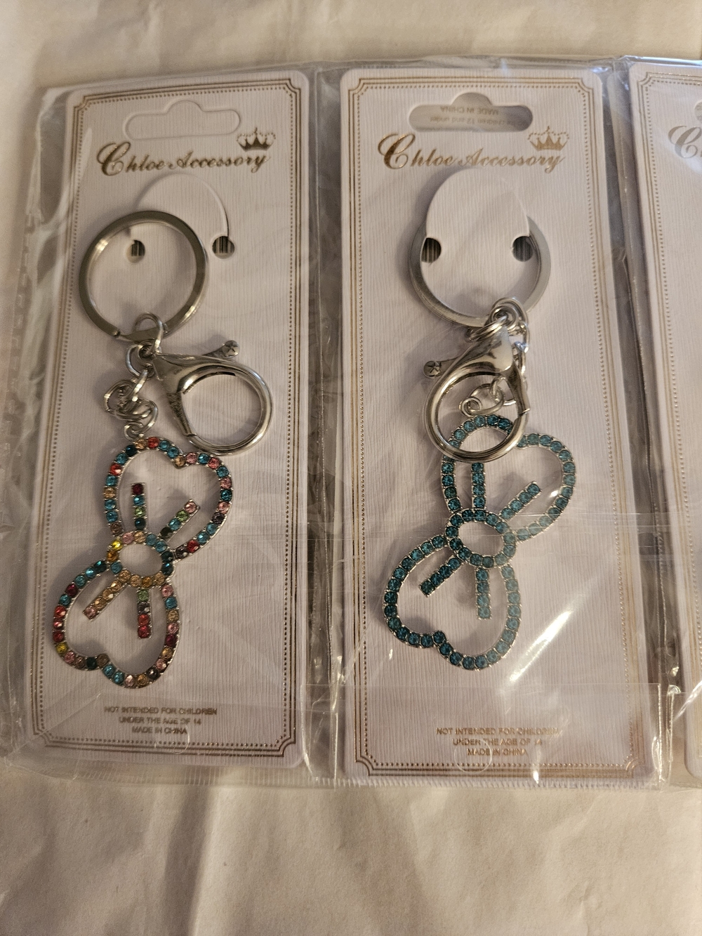 6 Silver Keychain with Blue Rhinestone Bow